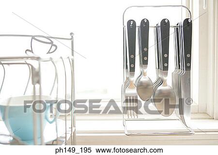 Close-up of kitchen utensils View Large Photo Image Stock Photography - Close-up of kitchen utensils. Fotosearch