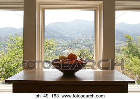Close-up of oranges and a mango in a fruit bowl View Large Photo Image Stock Image - Close-up of oranges and a mango in a fruit bowl. Fotosearch