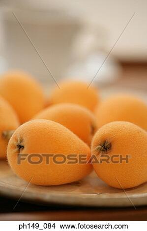 Close-up of ripe loquats in a plate View Large Photo Image Picture - Close-up of ripe loquats in a plate. Fotosearch
