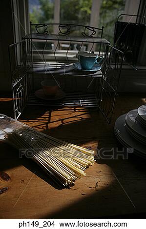 Close-up of spaghetti in the kitchen View Large Photo Image Picture - Close-up of spaghetti in the kitchen. Fotosearch