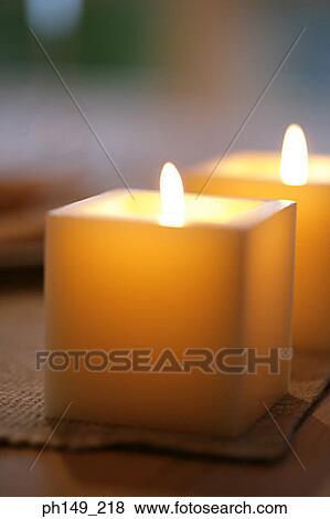 Close-up of two candles View Large Photo Image Stock Photo - Close-up of two candles. Fotosearch