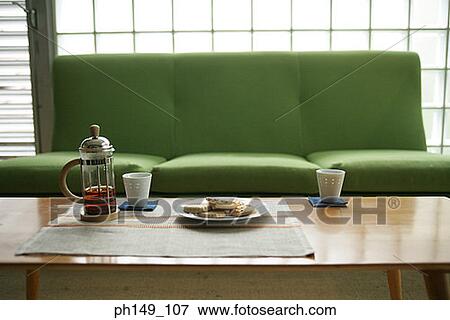 Coffee maker and two cups with a plate of cookies on the table View Large Photo Image Stock Photo - Coffee maker and two cups with a plate of cookies on the table. Fotosearch