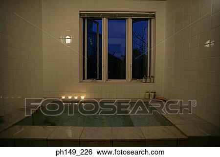 Four candles on the side of a bathtub View Large Photo Image Stock Photograph - Four candles on the side of a bathtub. Fotosearch