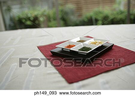 High angle view of assorted spices on a tray View Large Photo Image Stock Image - High angle view of assorted spices on a tray. Fotosearch