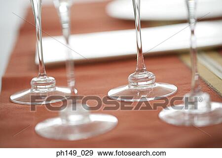 Low section view of four stem glasses View Large Photo Image Stock Photo - Low section view of four stem glasses. Fotosearch