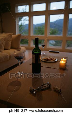 Wine bottle with a cork and a corkscrew View Large Photo Image Stock Photo - Wine bottle with a cork and a corkscrew. Fotosearch