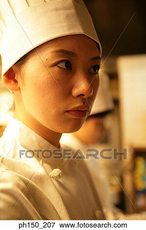 Close-up of a female chef View Large Photo Image Stock Photo - Close-up of a female chef. Fotosearch