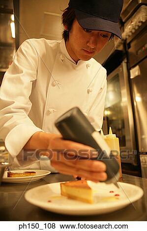Close-up of a waiter dripping sauce on a piece of bread View Large Photo Image Stock Photo - Close-up of a waiter dripping sauce on a piece of bread. Fotosearch