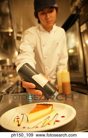 Close-up of a waiter dripping sauce on a piece of bread View Large Photo Image Stock Photo - Close-up of a waiter dripping sauce on a piece of bread. Fotosearch
