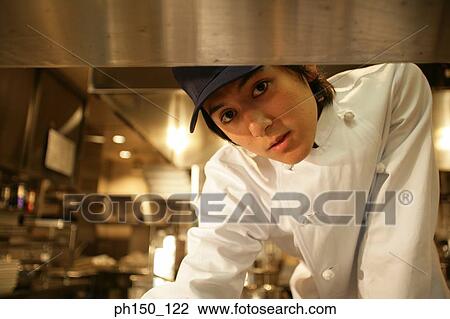 Close-up of a waiter standing in the kitchen View Large Photo Image Stock Image - Close-up of a waiter standing in the kitchen. Fotosearch