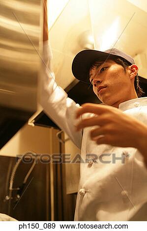 Close-up of a waiter View Large Photo Image Stock Photo - Close-up of a waiter. Fotosearch