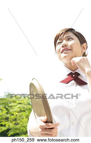 Close-up of a waitress holding a serving tray View Large Photo Image Stock Photo - Close-up of a waitress holding a serving tray. Fotosearch