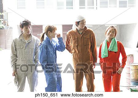 Four auto mechanics standing in an auto repair shop View Large Photo Image Stock Image - Four auto mechanics standing in an auto repair shop. Fotosearch