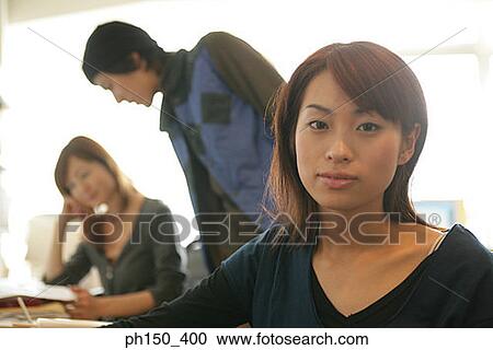 Portrait of a businesswoman in an office View Large Photo Image Stock Image - Portrait of a businesswoman in an office. Fotosearch