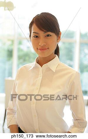 Portrait of a waitress in a restaurant View Large Photo Image Stock Image - Portrait of a waitress in a restaurant. Fotosearch