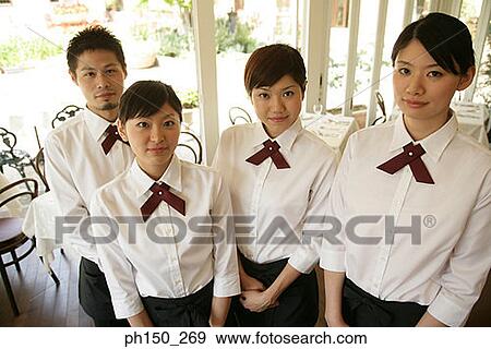 Portrait of three waitresses and a waiter View Large Photo Image Stock Photo - Portrait of three waitresses and a waiter. Fotosearch