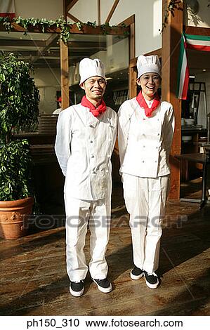 Portrait of two chefs standing in front of a restaurant View Large Photo Image Stock Image - Portrait of two chefs standing in front of a restaurant. Fotosearch