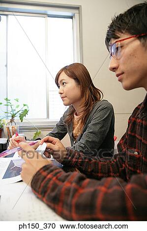 Side profile of a businessman and a businesswoman View Large Photo Image Stock Image - Side profile of a businessman and a businesswoman. Fotosearch