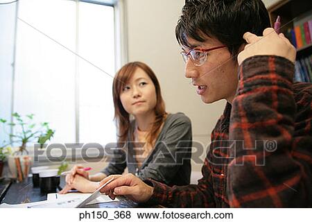 Side profile of a businessman and a businesswoman View Large Photo Image Stock Photo - Side profile of a businessman and a businesswoman. Fotosearch