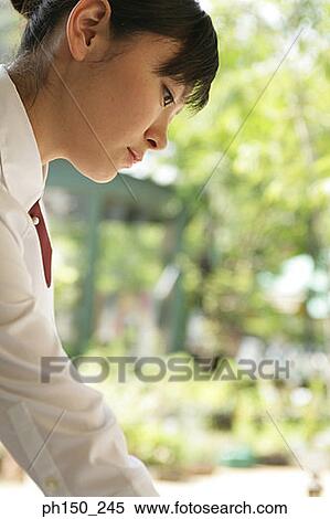 Side profile of a waitress View Large Photo Image Stock Photography - Side profile of a waitress. Fotosearch