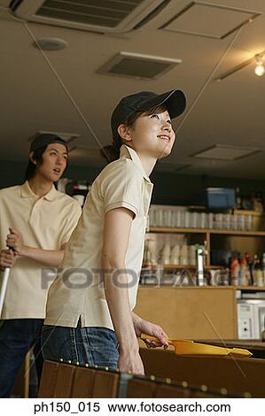Side profile of a young woman and a young man looking up View Large Photo Image Stock Photography - Side profile of a young woman and a young man looking up. Fotosearch