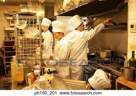 Three female chefs and one male chef in the kitchen View Large Photo Image Stock Image - Three female chefs and one male chef in the kitchen. Fotosearch