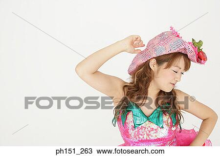 Close-up of a young woman dancing with her eyes closed View Large Photo Image Stock Image - Close-up of a young woman dancing with her eyes closed. Fotosearch