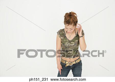 Close-up of a young woman with her eyes closed View Large Photo Image Stock Image - Close-up of a young woman with her eyes closed. Fotosearch