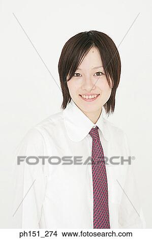 Portrait of a businesswoman smiling View Large Photo Image Picture - Portrait of a businesswoman smiling. Fotosearch