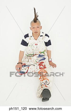 Portrait of a punk young man posing View Large Photo Image Stock Image - Portrait of a punk young man posing. Fotosearch