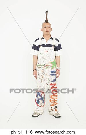 Portrait of a punk young man posing View Large Photo Image Stock Photograph - Portrait of a punk young man posing. Fotosearch