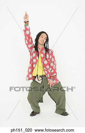 Stock Image - Portrait of a young man posing. Fotosearch
