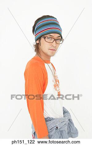 Portrait of a young man posing View Large Photo Image Stock Image - Portrait of a young man posing. Fotosearch