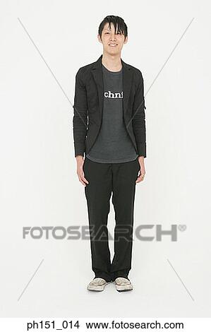 Portrait of a young man smiling View Large Photo Image Picture - Portrait of a young man smiling. Fotosearch