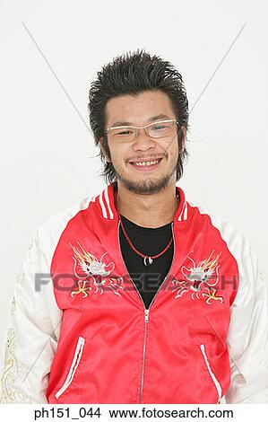 Picture - Portrait of a young man smiling. Fotosearch