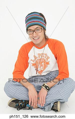 Stock Photograph - Portrait of a young man smiling. Fotosearch