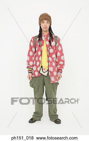 Stock Photo - Portrait of a young man standing. Fotosearch