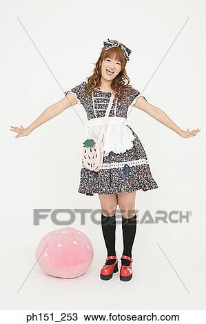 Stock Image - Portrait of a young woman smiling. Fotosearch