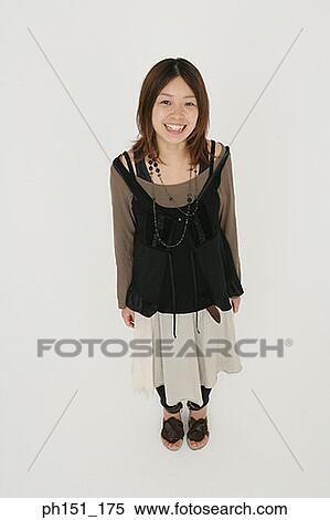 Portrait of a young woman smiling View Large Photo Image Stock Photography - Portrait of a young woman smiling. Fotosearch