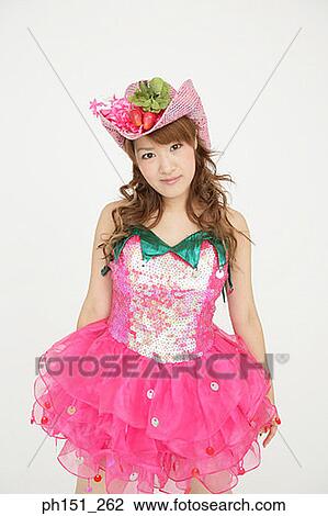 Portrait of a young woman wearing a frock View Large Photo Image Stock Image - Portrait of a young woman wearing a frock. Fotosearch