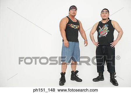 Portrait of two mid adult men standing together View Large Photo Image Stock Photo - Portrait of two mid adult men standing together. Fotosearch
