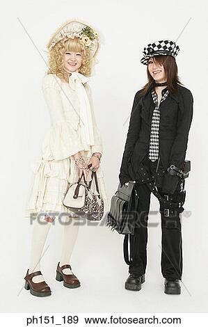 Stock Photo - Portrait of two young women smiling. Fotosearch