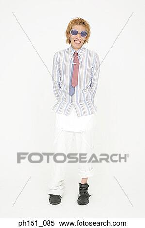 Teenage boy looking cheerful View Large Photo Image Stock Photography - Teenage boy looking cheerful. Fotosearch