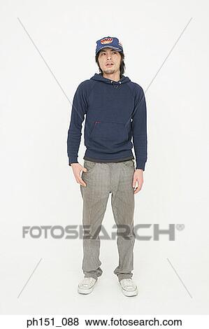 Young man looking away View Large Photo Image Stock Photo - Young man looking away. Fotosearch