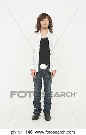 Young man looking up View Large Photo Image Stock Photograph - Young man looking up. Fotosearch
