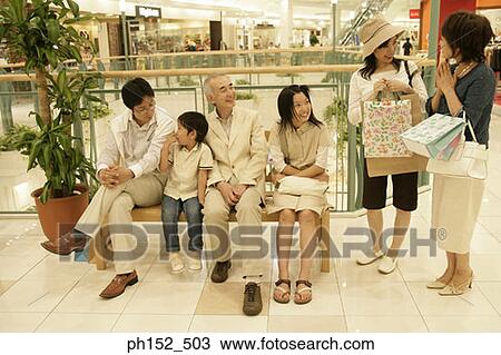 Family in a shopping mall View Large Photo Image Stock Image - Family in a shopping mall. Fotosearch