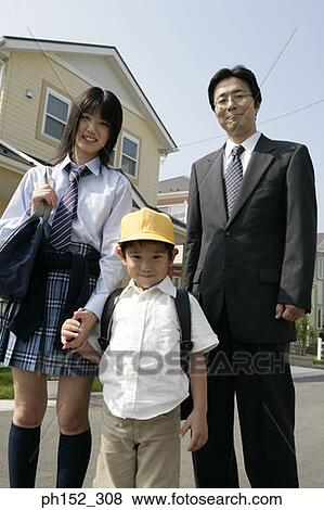 Portrait of a mature man standing with his son and daughter on the road View Large Photo Image Stock Photo - Portrait of a mature man standing with his son and daughter on the road. Fotosearch
