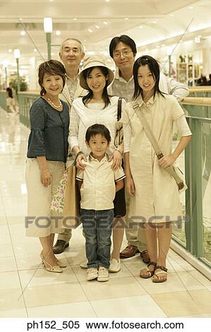 Portrait of a three generation family at a shopping mall View Large Photo Image Stock Photography - Portrait of a three generation family at a shopping mall. Fotosearch