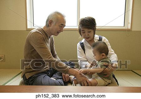 Senior couple with their grandson View Large Photo Image Stock Image - Senior couple with their grandson. Fotosearch