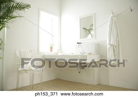 Bathroom sink beside a window View Large Photo Image Stock Image - Bathroom sink beside a window. Fotosearch